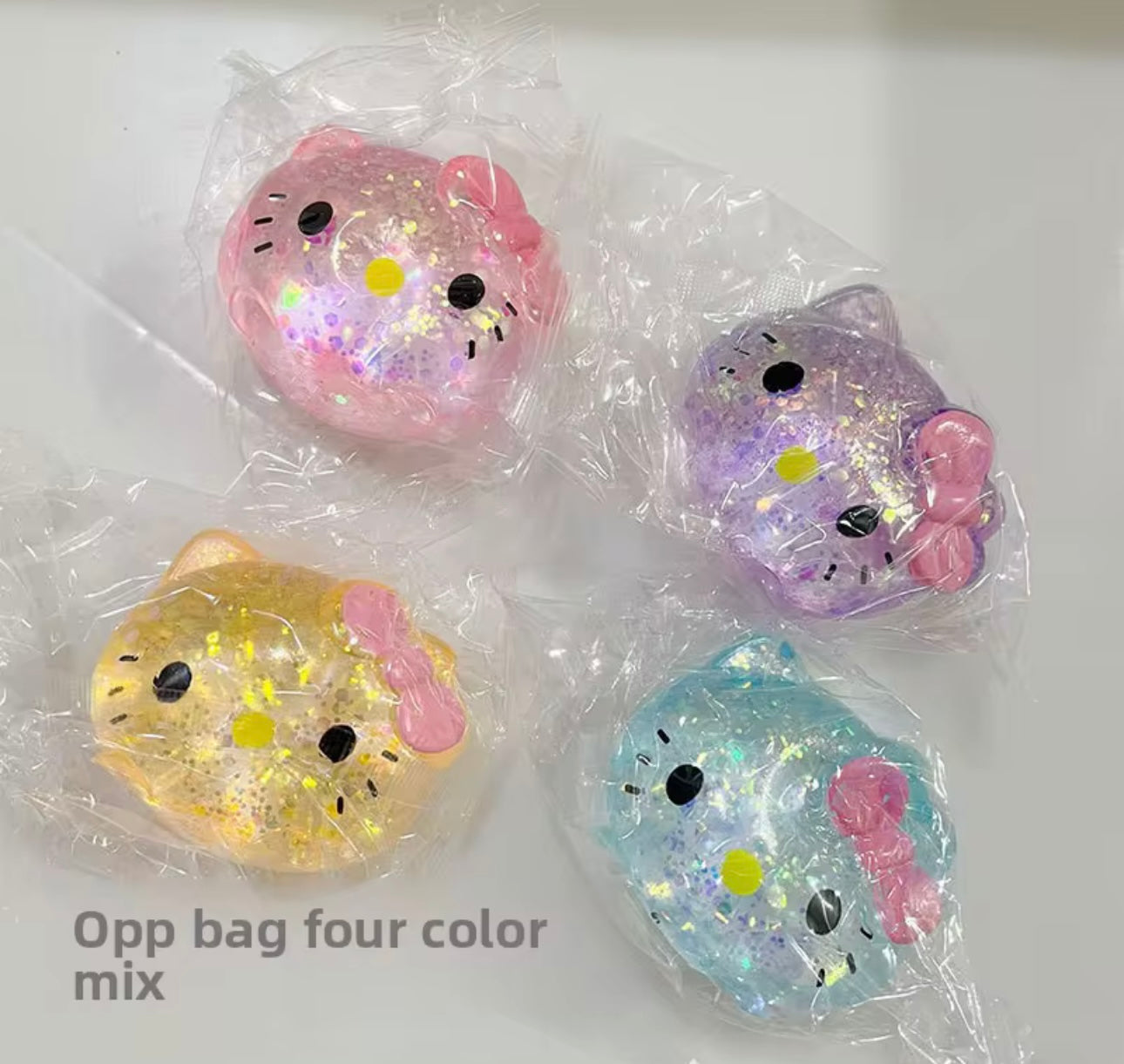 Hello Kitty Glitter Head Squishy (In Stock)